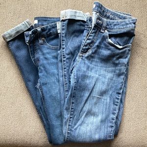 2 pairs of cuffed jeans